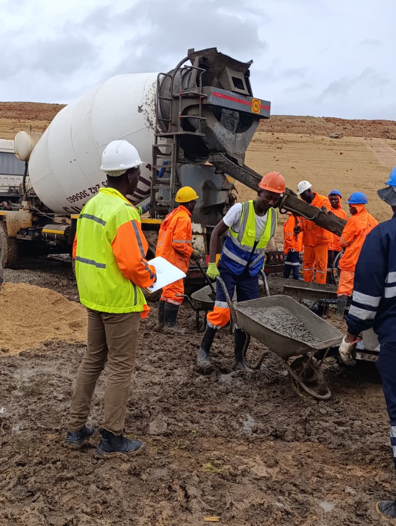 Lawnlink personnel monitoring concrete placement on a construction site